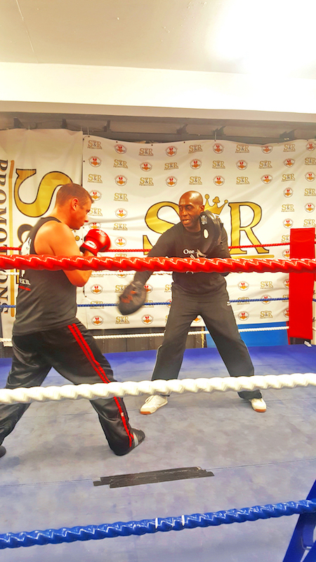 Rob practices pad work in the Isleworth Gym with an advanced student
